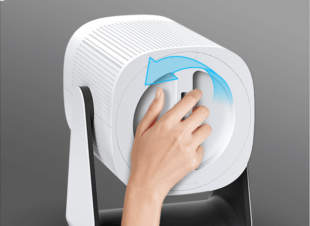 Vri lokket på baksiden til venstre for å åpne